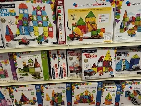 Magna-Tiles building sets on the shelf at Kids Cargo
