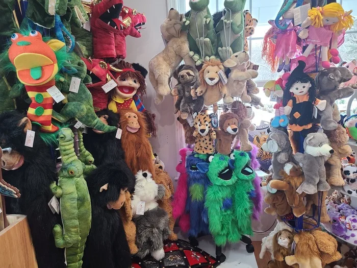 Puppets and plush characters on display at Kids Cargo